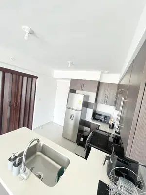 a kitchen with a sink and a counter top at Apartamento en San Pablo, Heredia, Costa Rica in San Pablo