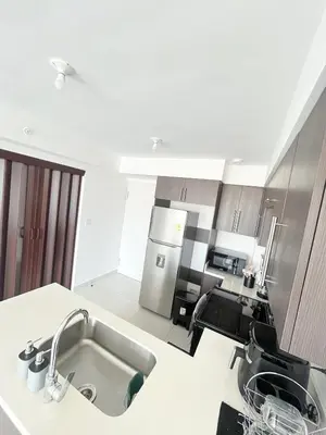 a kitchen with a sink and a counter top at Apartamento en San Pablo, Heredia, Costa Rica in San Pablo