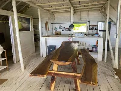 a wooden table and chairs in a kitchen at Casa de los Artistas in Marbella