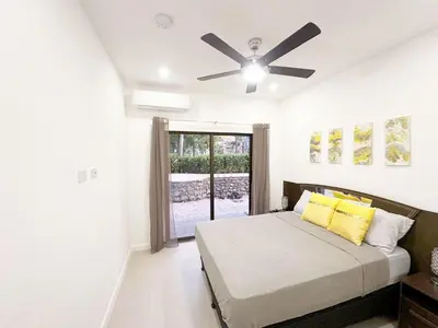 a bedroom with a bed and a ceiling fan at LPT15 in Villarreal