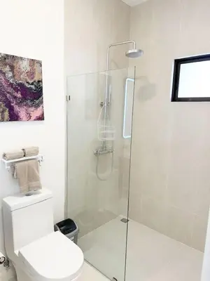a bathroom with a glass shower with a toilet at LPT15 in Villarreal