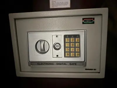 an electronic digital safe is shown at Monaco Condominiums Unit 7 Luxury Pool View Condo 3BR 2BA - Walk to the Beach, Shopping, Tours in Jacó