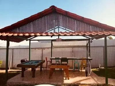 a pavilion with a ping pong table and a ping at Casa para vacacionar Orotina in Orotina