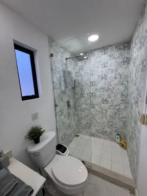 a bathroom with a toilet and a shower at Peaceful 1BR Casita with Private Deck Near Tamarindo in Tamarindo