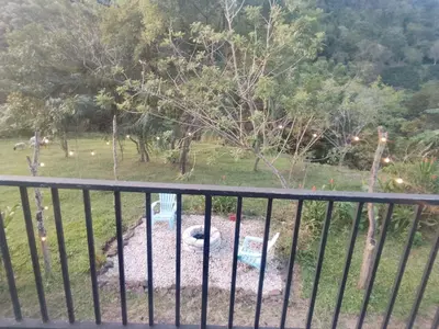 a view of a park from a fence at Cabaña La paz in Alajuela City
