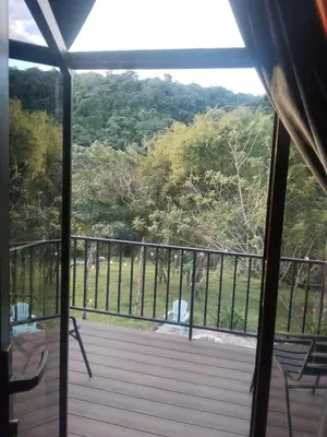 a view from the balcony of a house at Cabaña La paz in Alajuela City