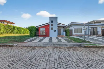 a brick road in front of a house at Casa Dasani - Beautiful House with private pool in Santa Rosa
