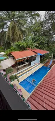 an overhead view of a house with a swimming pool at Tres Diamantes Casa Completa in Parrita