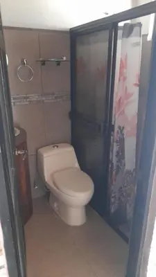 a small bathroom with a toilet and a shower at Vacation Home in Santa Cruz in Santa Cruz