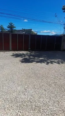 a fence in a parking lot next to a building at Vacation Home in Santa Cruz in Santa Cruz