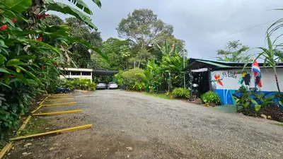 an empty road in front of a building at Inta Tiny House in Fortuna