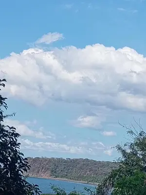 a view of a body of water under a cloudy sky at Villa Sonia in Caldera