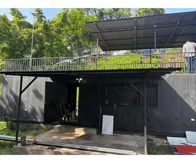 a house under construction with a balcony on top at Villa Sonia in Caldera