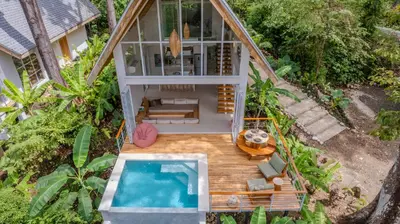 an aerial view of a house with a swimming pool at Casa Terra - Modern House with Ocean Views in Santa Teresa Beach