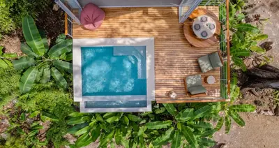 an overhead view of a swimming pool in a resort at Casa Solana - Modern House with Ocean Views in Santa Teresa Beach