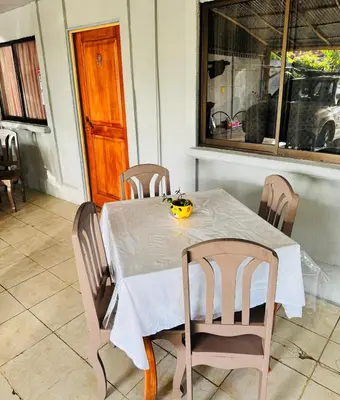 a dining room table with chairs and a bowl on it at Complete house for 6 people in Chiles