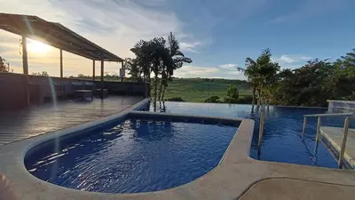 a swimming pool in the middle of a house at SJO - Casa Taccari in Grecia