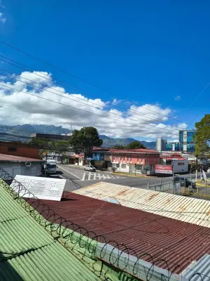 a view of a city from the roof of a building at Vilma Friendly Guesthouse - RC in San José