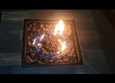 a picture of a fire in a bowl of food at Tree House River in Palma