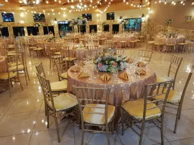 a banquet hall with a long table with chairs at Hotel Cibeles Resort in Heredia