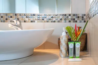a bathroom with a sink and a white sink at Villa Girasole - Villaggio 6 in Potrero