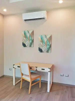 a desk with a chair and a ceiling fan at Majestic View House in Dominical, Oceanview in San Luis