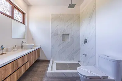 a bathroom with a shower and a toilet and a sink at Casa Samay in Playa Avellana