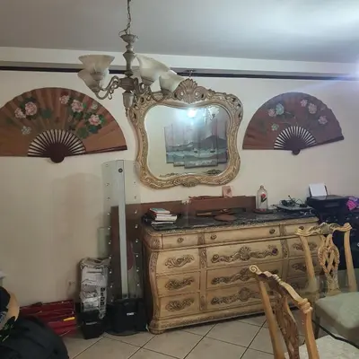 a room with a dresser and a mirror on the wall at Rooms For RENT, Roommates, Or As BB in Heredia
