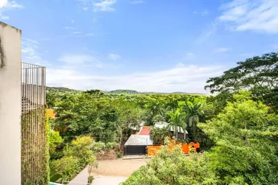 an overhead view of a building in the jungle at TL1 Bright Stylish Loft with Green Views in Tamarindo