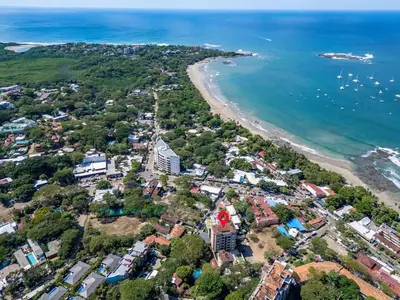 an aerial view of a beach and the ocean at Elegant Oceanview 2BR Condo 2-Min Walk to Beach in Tamarindo