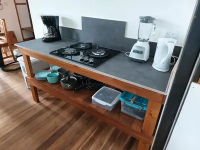 a kitchen counter with a stove and a blender at Jungle Studio in Drake Bay in Drake