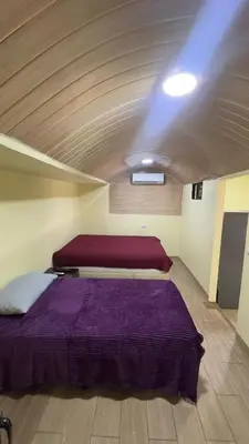 a bedroom with a large bed in a room at Casa Antioquia #4 in Garita