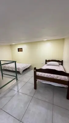 a bedroom with two beds in a room at Casa Antioquia #2 in Garita