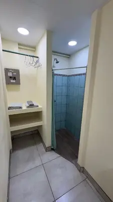 a bathroom with a shower and a sink in it at Casa Antioquia #2 in Garita