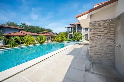 an image of a swimming pool in a villa at Casa Luna - Villaggio 6 in Potrero