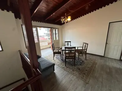 a dining room with a table and chairs at Hostal Canarias in San José