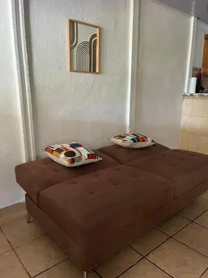 a bed in a room with two pillows on it at Complete house for 6 people in San Isidro
