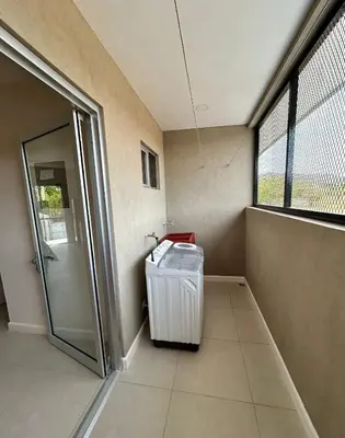 a room with a trash can and a window at Josuary in Brasilito