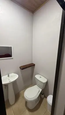 a bathroom with a toilet and a sink at Casa Antioquia #6 in Garita