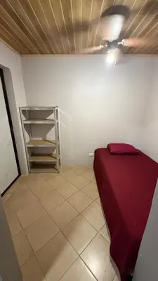 a room with a red bed and a shelf at Casa Antioquia #6 in Garita