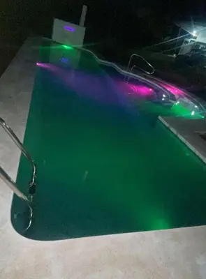 a computer mouse with green and purple lights at Tierra de Gosén in Santa Cruz
