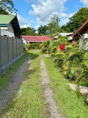 a dirt road in front of a house at Casa Jardín Arenal in San Francisco