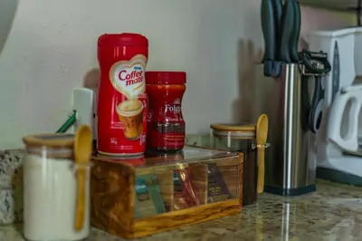 a counter top with a container of food and drinks at Toucan River Retreat - River Access, AC & Jacuzzi in San Francisco