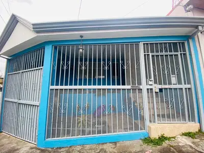 a cage with graffiti on the front of a building at Hermosa House Tibas