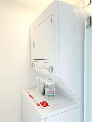 a white cabinet with a mirror above it in a bathroom at Horizonte Al Este in Granadilla