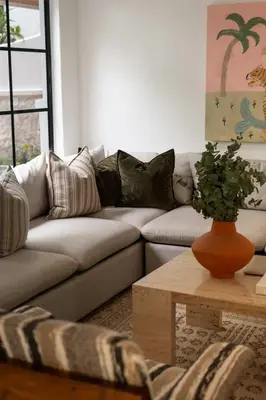 a living room with a couch and a coffee table at Villa Coro in Nosara