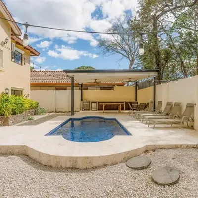 Elegant Surfside Retreat with Private Pool Spacious Outdoor Patio & Walkable Beach Access