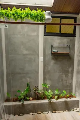 a room with a door with plants on it at Pejivalle Lodge paz y naturaleza en un solo lugar in Humo