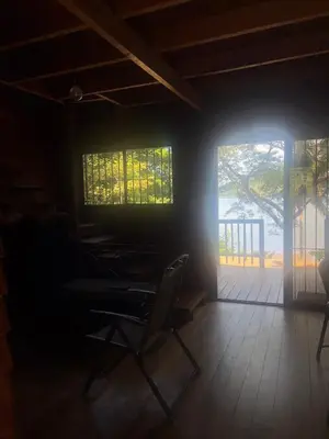 a room with a table and chairs and a window at Casa Carao Peninsula de Nicoya - front beach