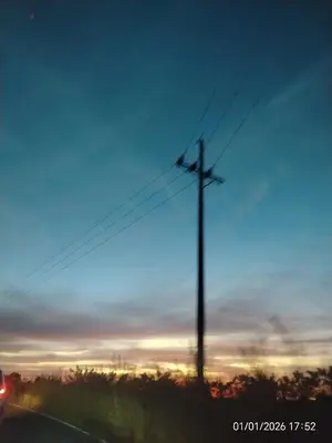 a telephone pole on the side of a road at Ordoñez in Bijagua